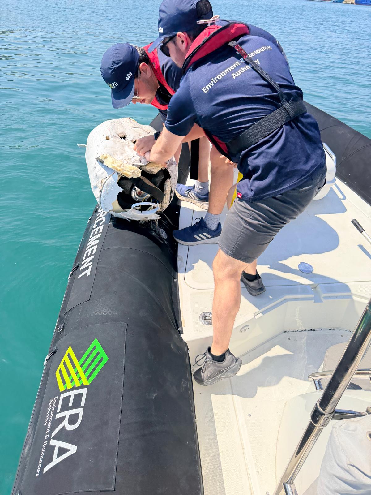 ERA officers recover discarded water heater from the sea